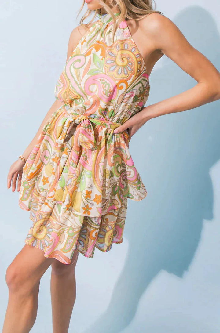 Dress- Ivory Printed woven mini dress featuring halter neckline, elasticized waist with self sash tie, layered skirt with back tie - Marian Style Boutique