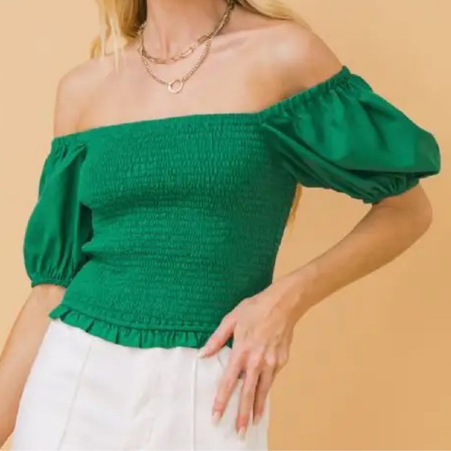 Blouses - A solid woven top featuring off shoulder neckline