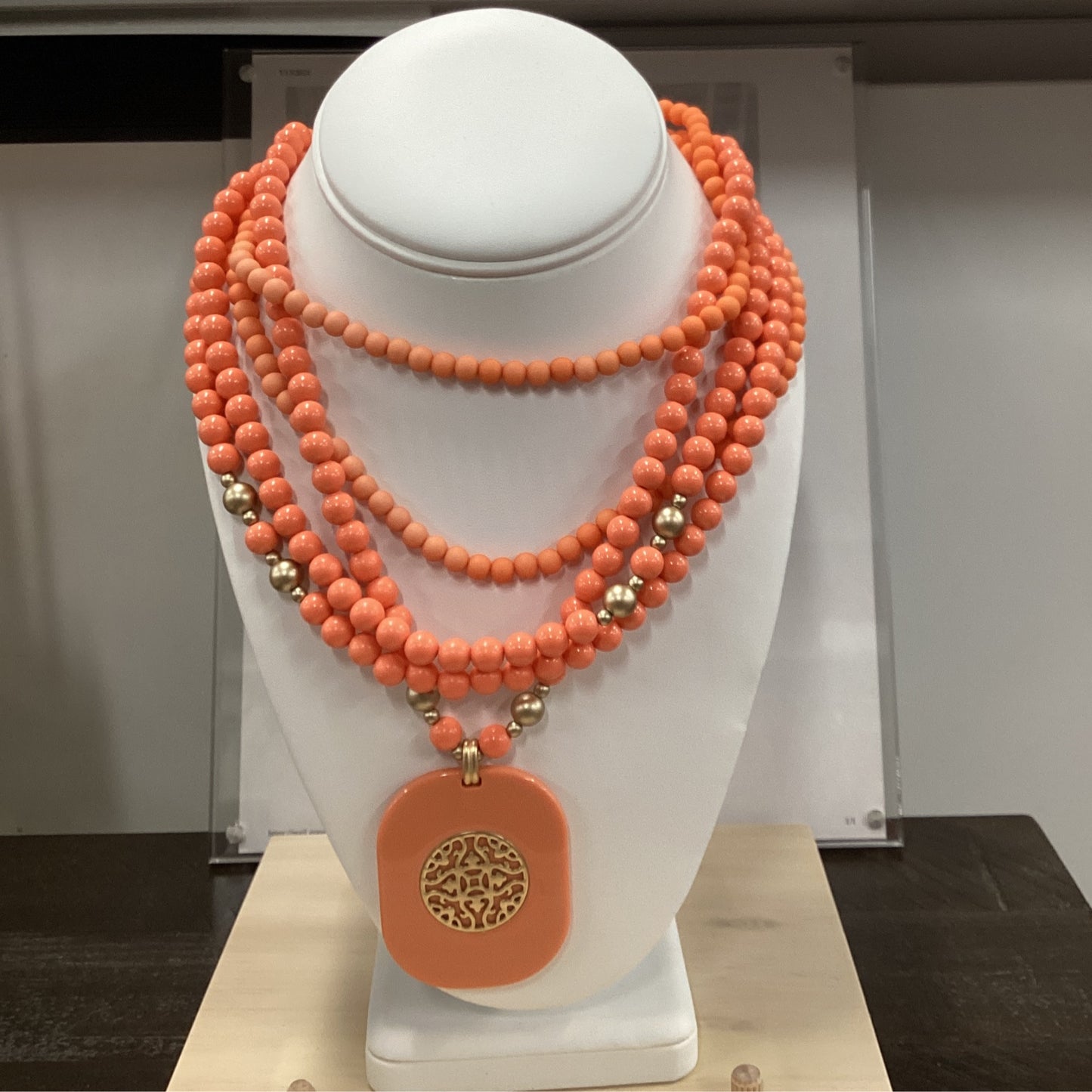 Necklace - plated emblem - coral