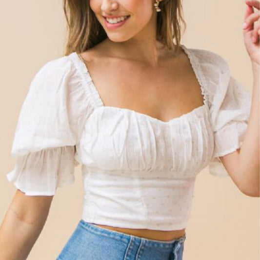 Blouses - A women top featuring sweetheart neckline