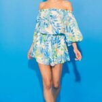 A printed woven romper featuring rompers